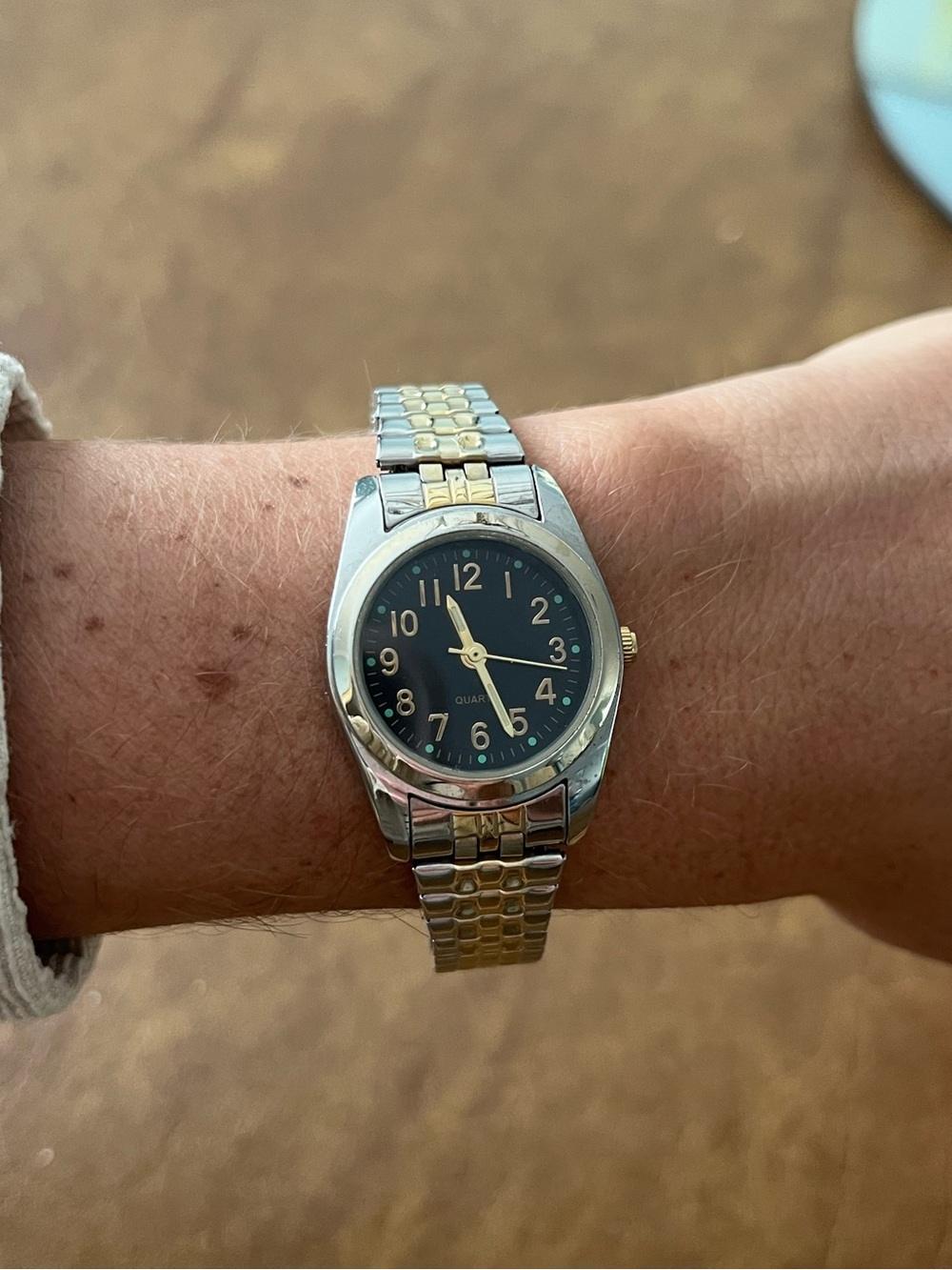 Two-Tone Silver and Gold Women's Wristwatch with Black Dial